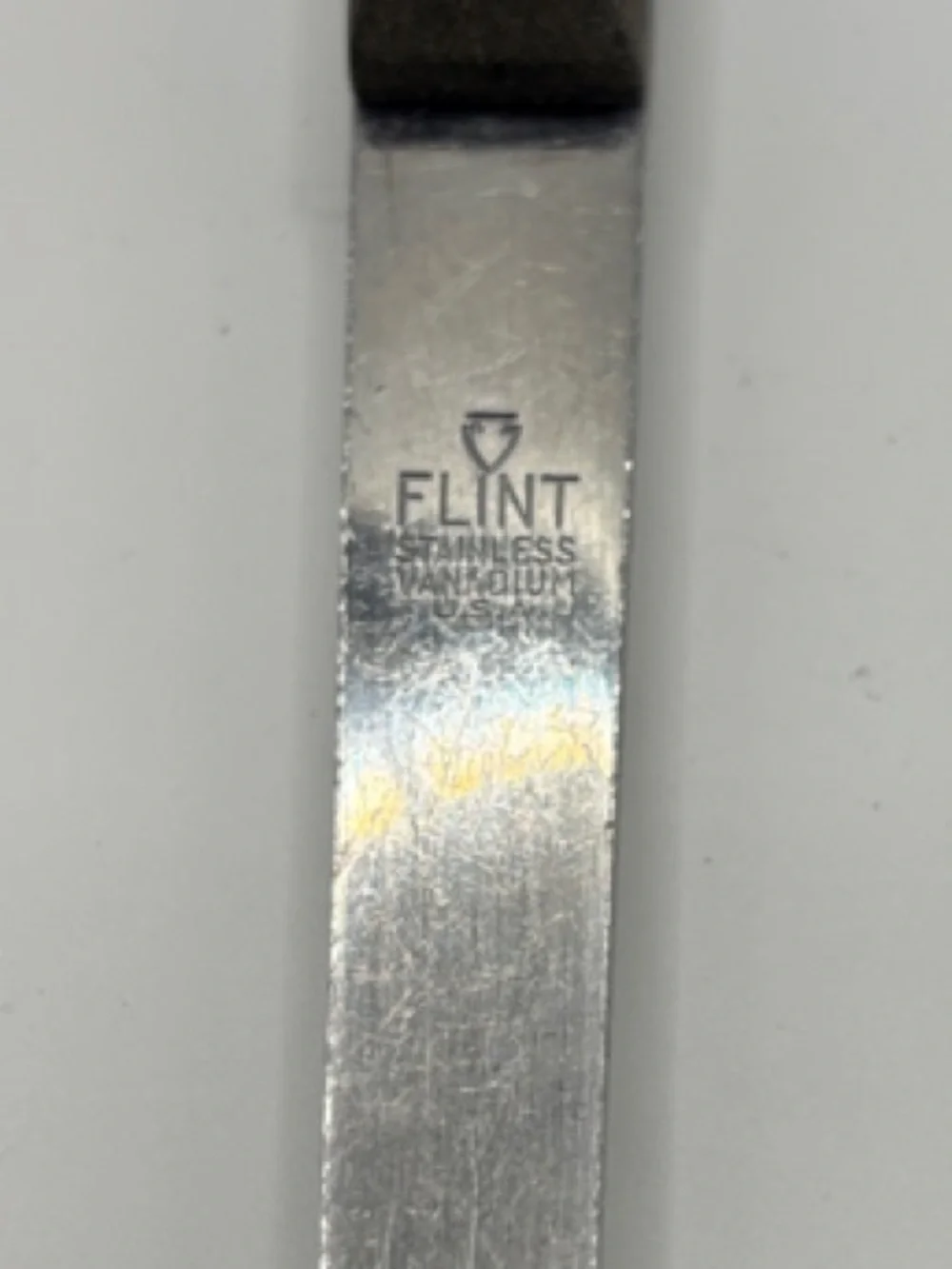 Ekco Flint Vanadium Stainless Serving Ladle with Dark Brown Handle